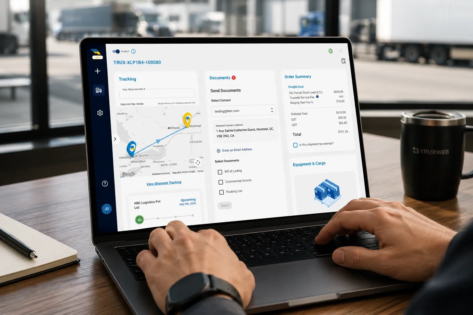 A laptop showing a detailed Truxweb booking breakdown